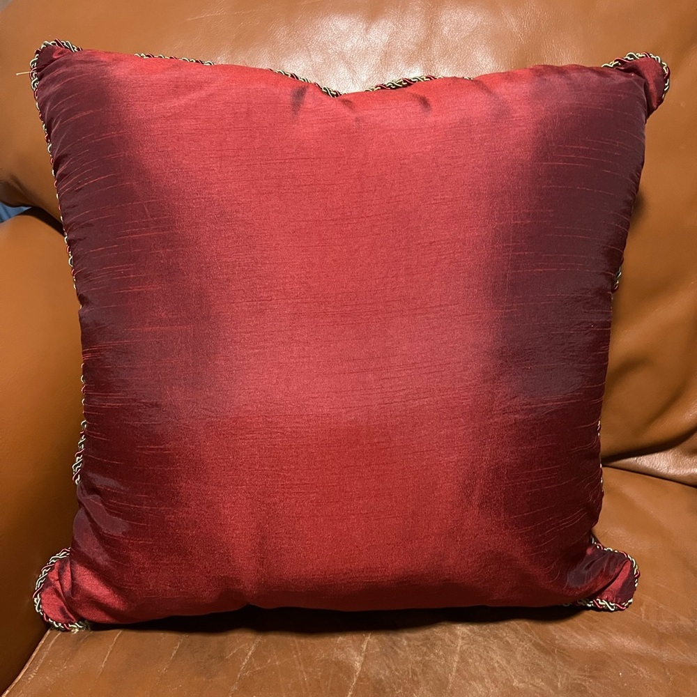 Ruby Red Decorative Pillow with colorful trim